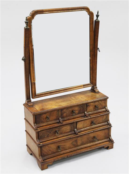 A Queen Anne style walnut dressing table mirror, H.2ft 6.5in.